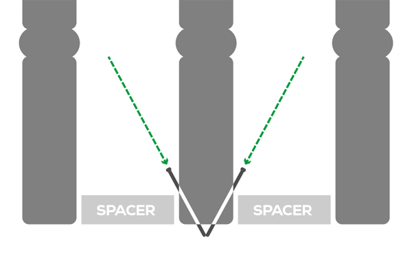an illustration of spindles being fitted into the decking