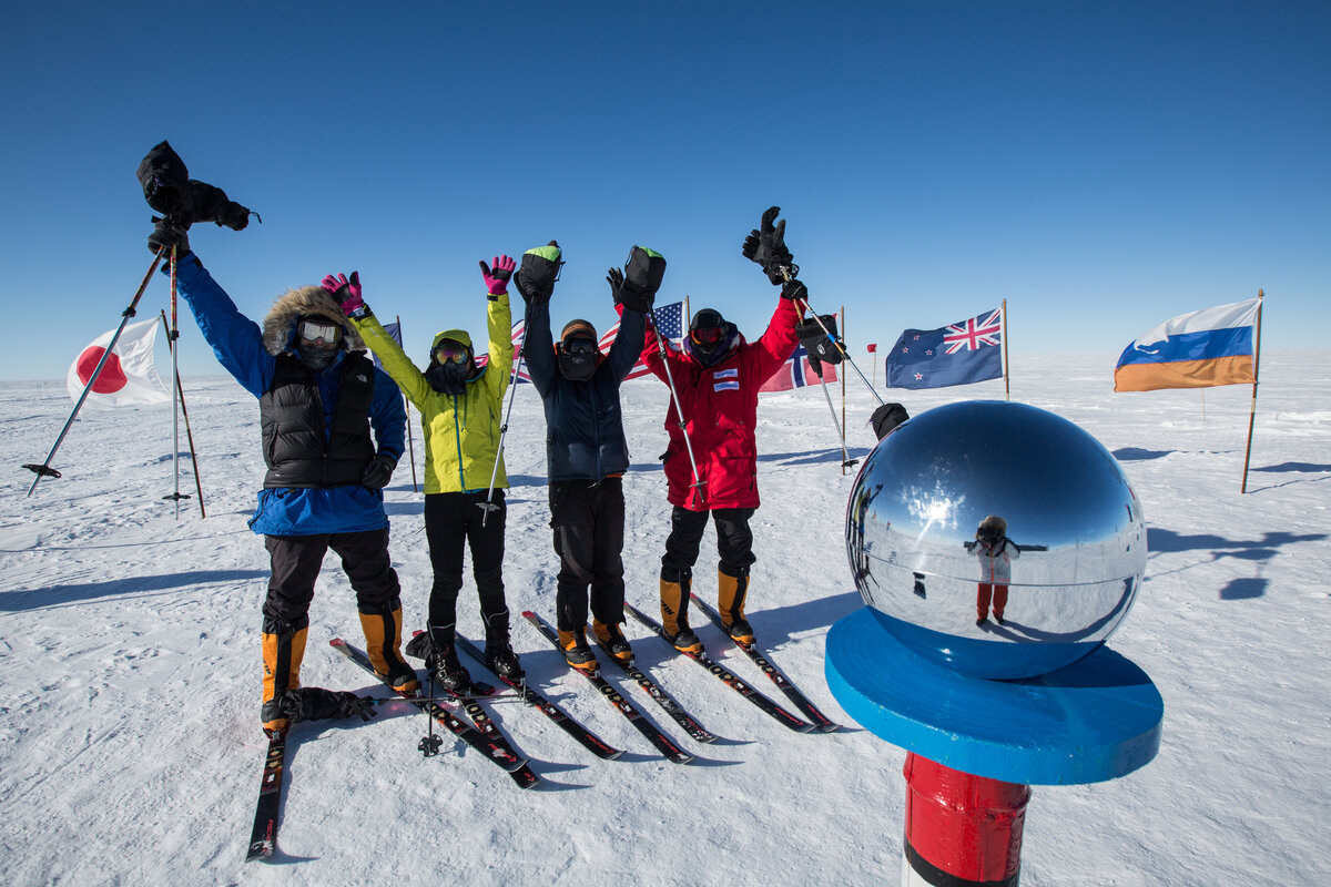 Team celebrates arrival at Ceremonial South Pole