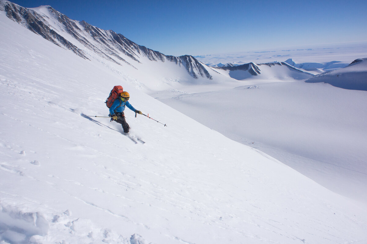 ALE guide 'Pachi' I. descends a slope on skis